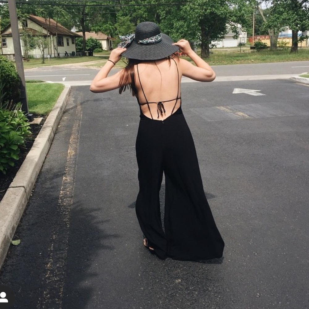 Black open back jumpsuit - size 6